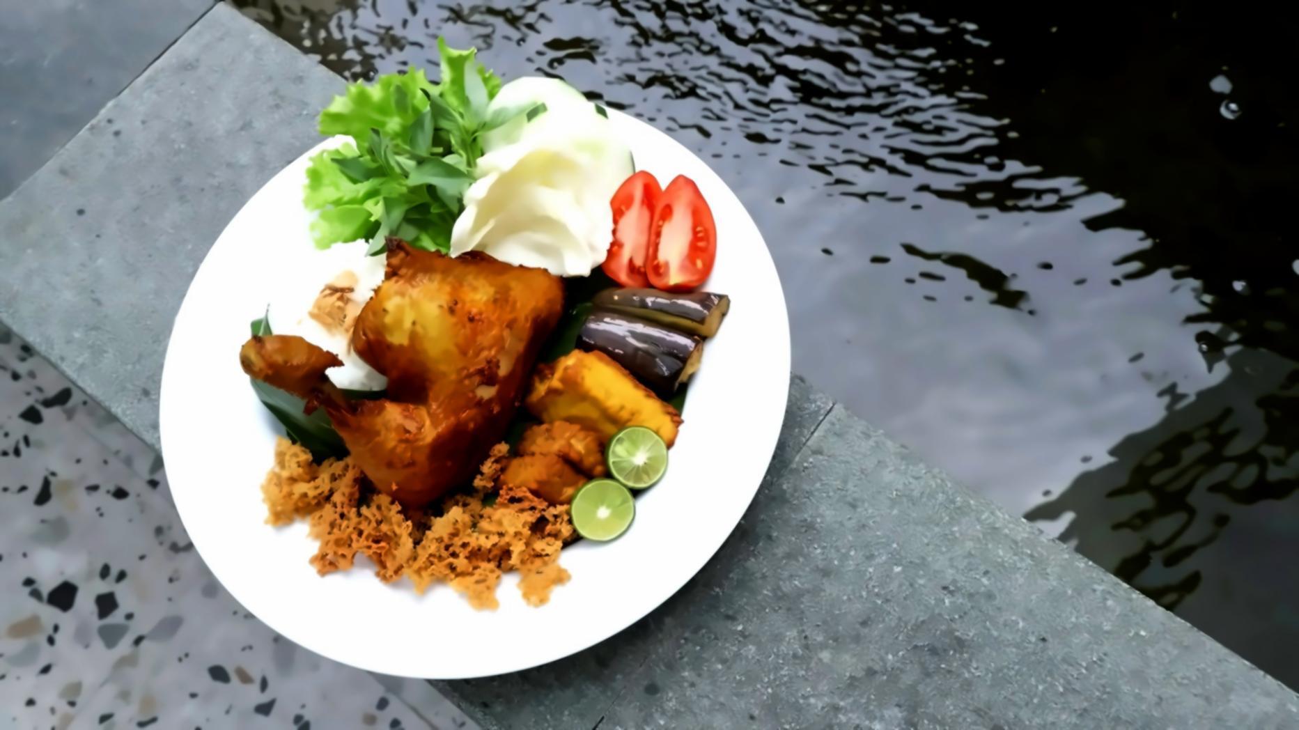 Modern home kitchen setup with organized cooking tools and fresh ingredients demonstrating practical workspace